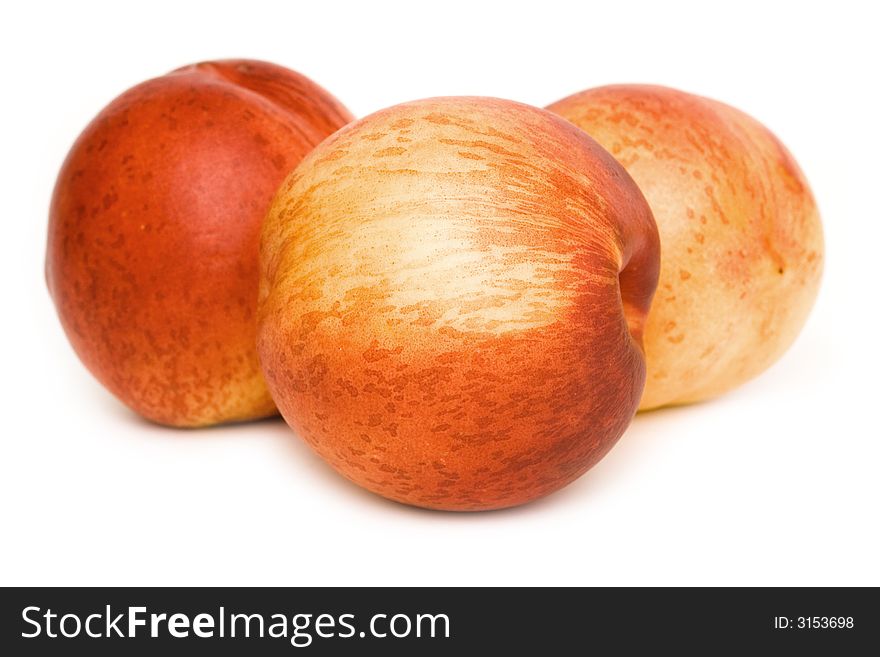 Close up of nectarines isolated on a white background. Close up of nectarines isolated on a white background