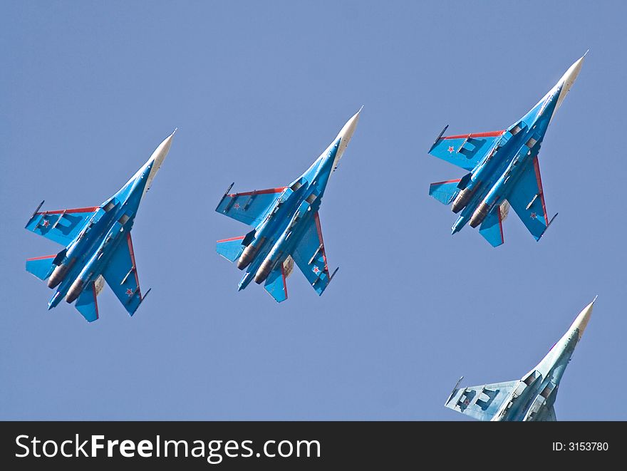 SU-27 interceptors. Flying group Russian Knights. Fly-past at 95th anniversary of Russian Air Force. 11 August 2007. SU-27 interceptors. Flying group Russian Knights. Fly-past at 95th anniversary of Russian Air Force. 11 August 2007