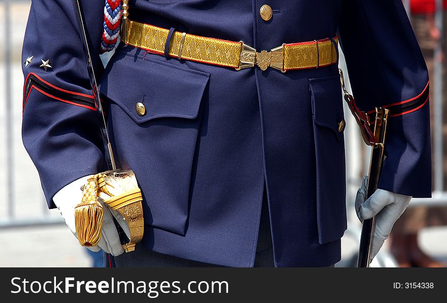 A detail of a soldiers ceremonial uniform