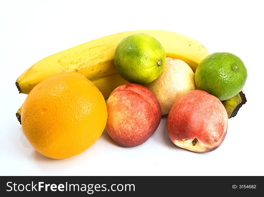 Bananas, peaches, lemons all isolated over white background with nice shadow. Bananas, peaches, lemons all isolated over white background with nice shadow