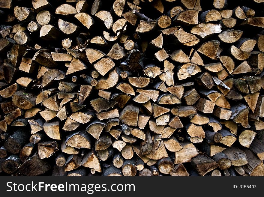 A pile of stacked timber. A pile of stacked timber