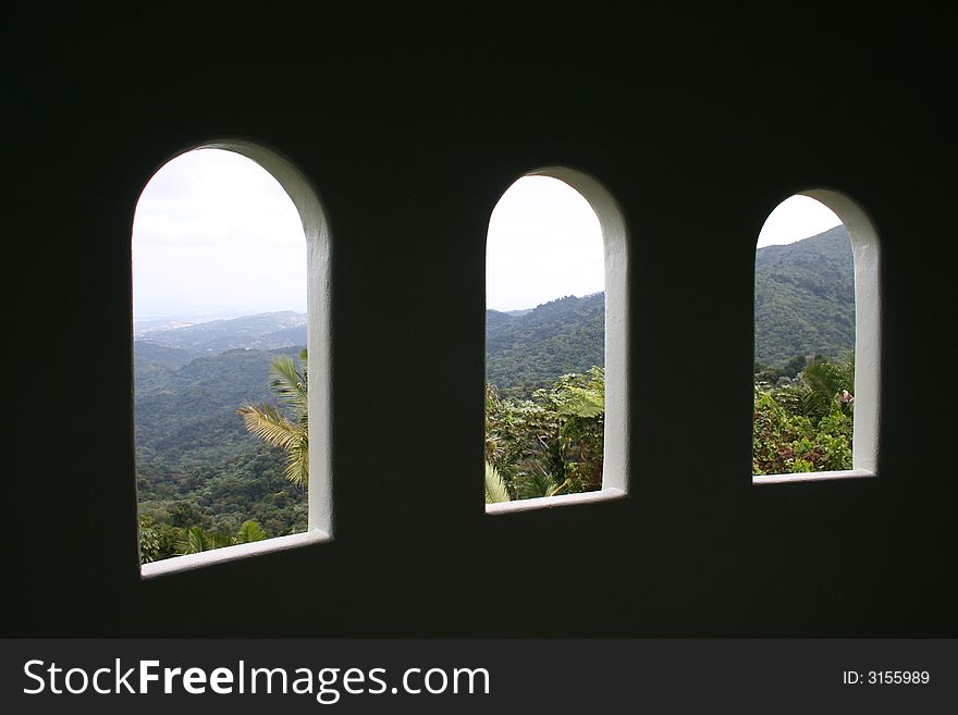 View out upper tower windows overlooking the rainforest in Puerto Rico. View out upper tower windows overlooking the rainforest in Puerto Rico.