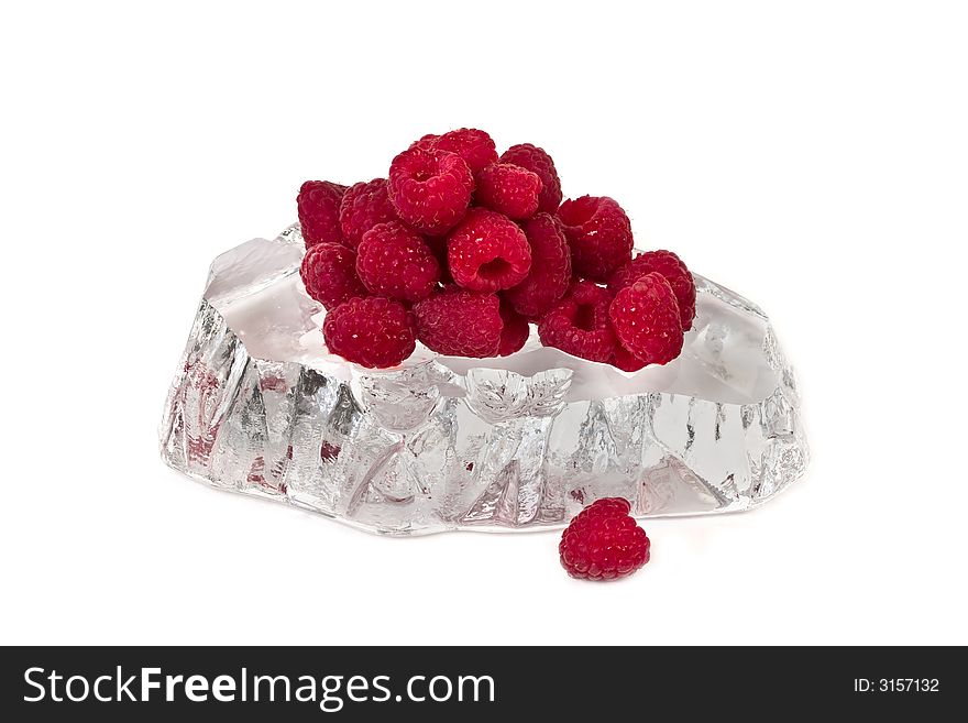 Raspberries on ice - isolated on white background