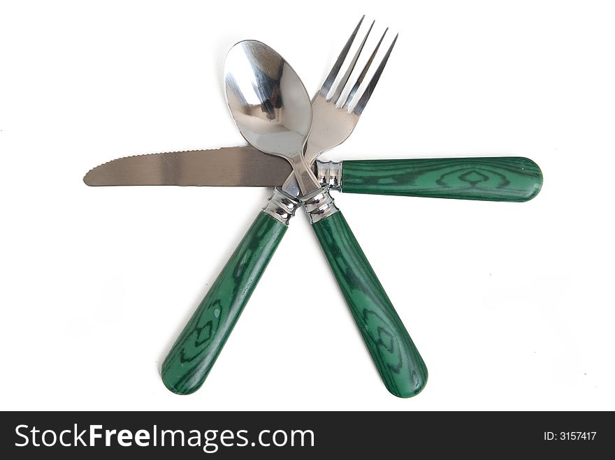 A fork, knife, and spoon on white with clipping paths. A fork, knife, and spoon on white with clipping paths.