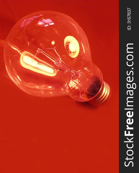 Industrial bulb on a red background