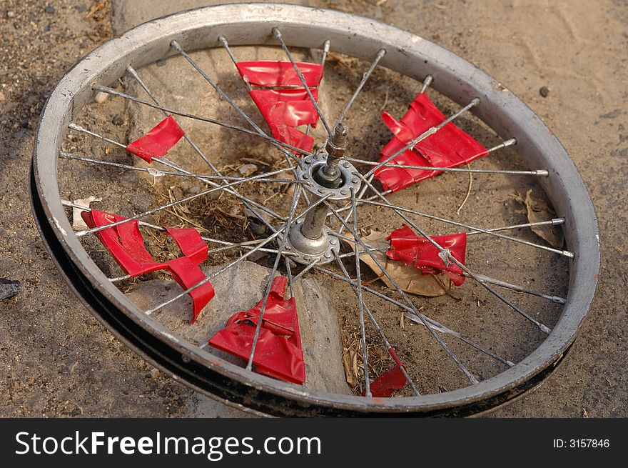 Old bicycle Rim view with red pettles. Old bicycle Rim view with red pettles