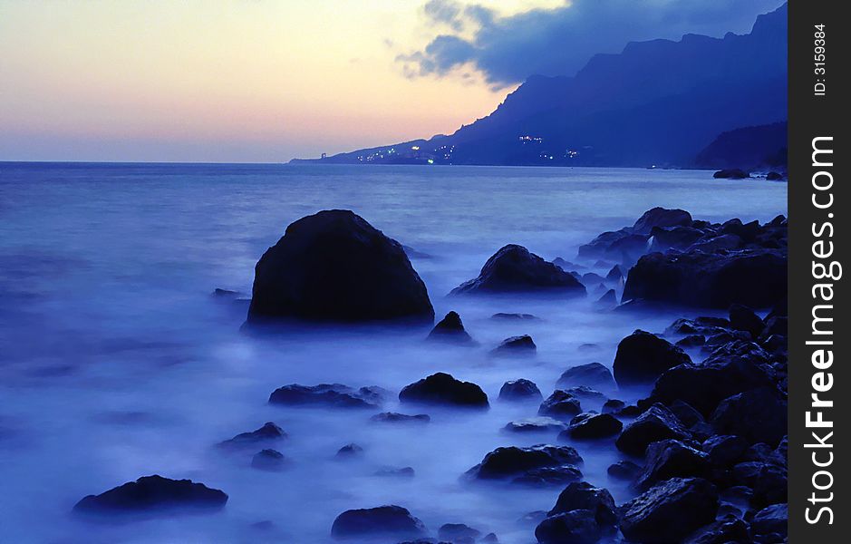 Evening landscape on a background of the sea. Evening landscape on a background of the sea