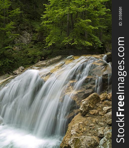 Waterfall On Mountain River