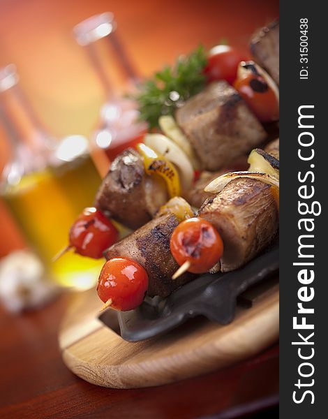 Meat and vegetable grilled skewers