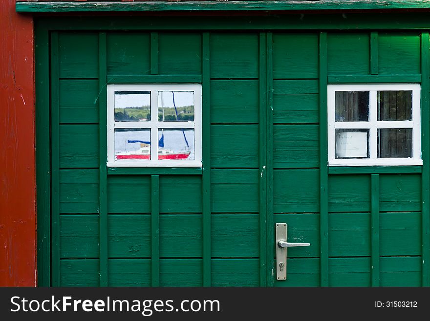 Window and door of a boathouse on Lake Ammersee