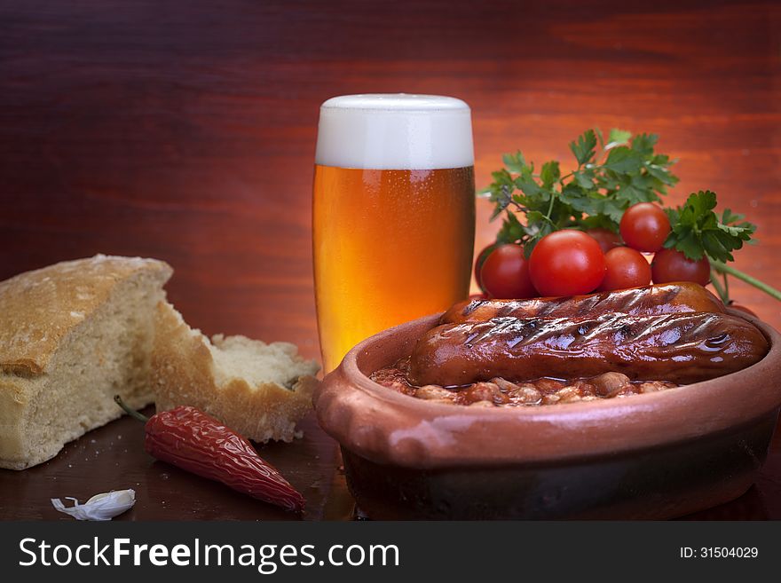 Baked beans, sausage and beer. Baked beans, sausage and beer