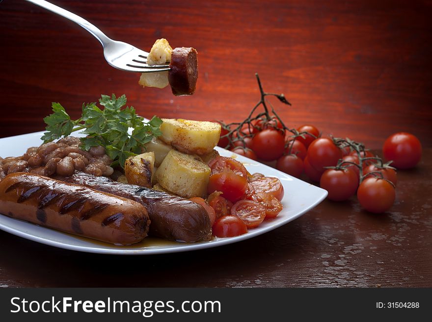 Baked beans, sausage and potato. Baked beans, sausage and potato