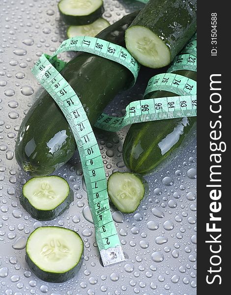 Organic cucumber with tape measure. Organic cucumber with tape measure