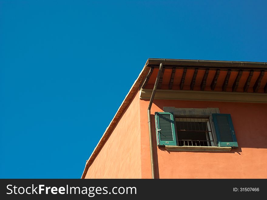 Tuscany house in clear blue sky background, Pisa, Italy