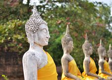 Ancient Buddha Statues At Wat Yai Chai Mongkol, Ayutthaya, Thail Stock Images Ancient Buddha Statues At Wat Yai Chai Mongkol, Ayutthaya, Thail Stock Images