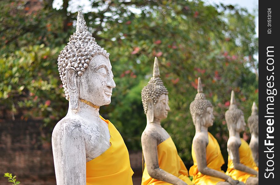 Ancient Buddha statues at Wat Yai Chai Mongkol, Ayutthaya, Thail