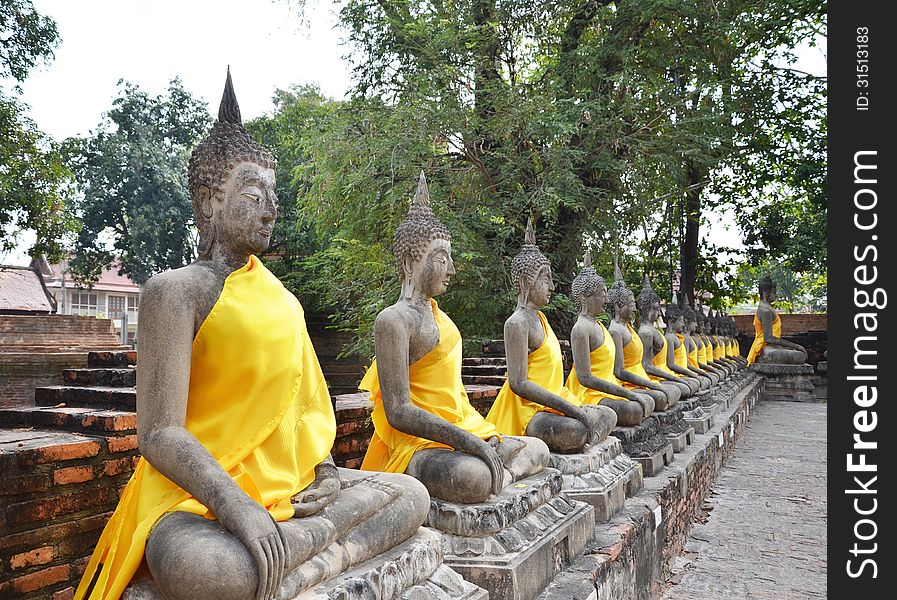 Ancient Buddha statues at Wat Yai Chai Mongkol in Ayutthaya, Thailand