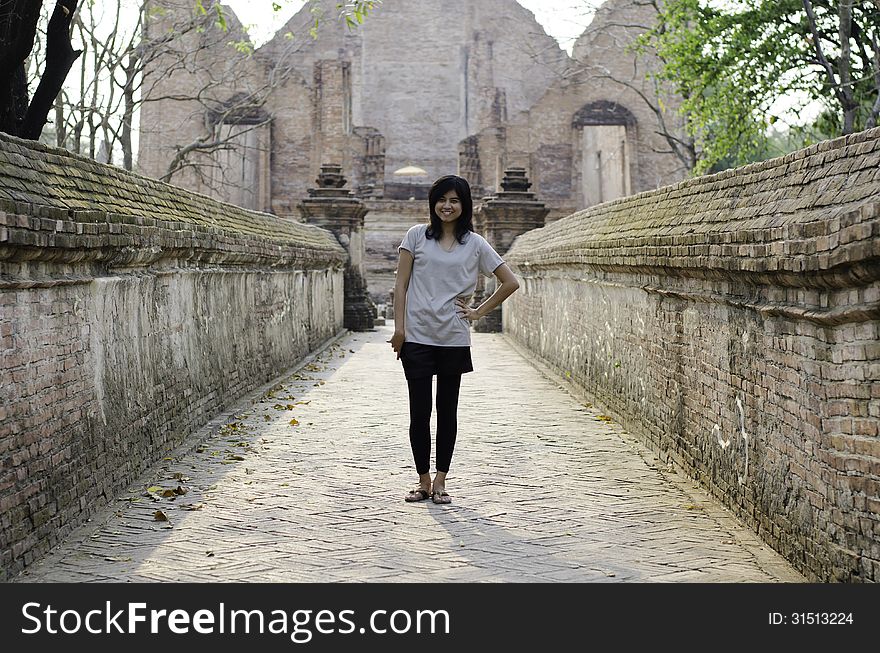 Asian Woman At Wat Maheyong, Buddhist Temple In Ayutthaya Provin