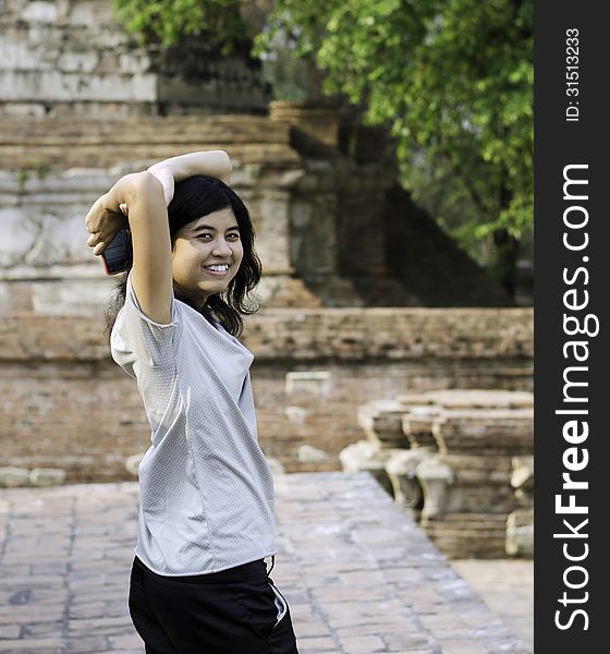 Asian Woman At Wat Maheyong Temple. Ayutthaya Province - Thailan