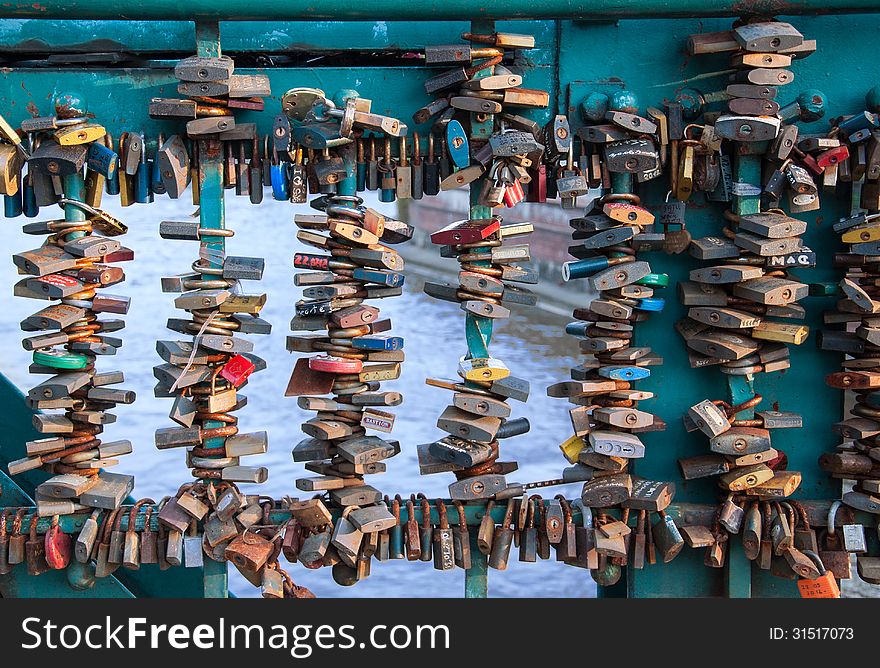 Locked padlocks on the bridge in Wroclaw, Poland, symbolizing the imperishability of love and marriage