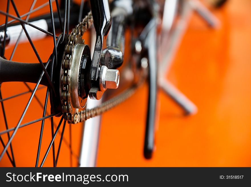 Low-down Shot of Bicycle Wheels and gearwheel