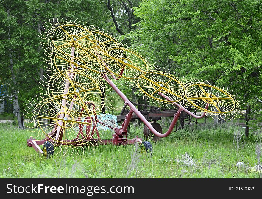 Cultivator machinery - wheel type rakes in the forest