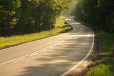 The Road Through The Forest. Royalty Free Stock Photo The Road Through The Forest. Royalty Free Stock Photo