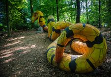 A Yellow And Black Concrete Snake Stock Photo A Yellow And Black Concrete Snake Stock Photo