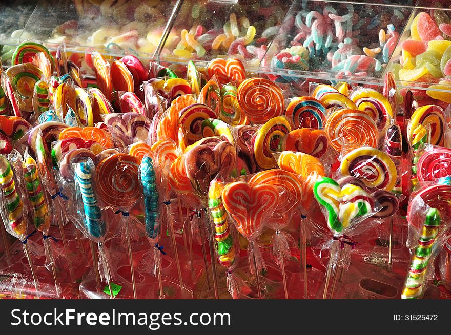 Some Fruit Lollipops candy's in a markeat.