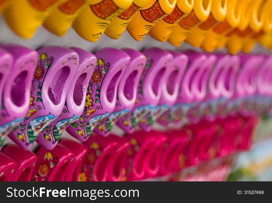 Detail of a colorful clogs, traditional shoes in Holland. Detail of a colorful clogs, traditional shoes in Holland.