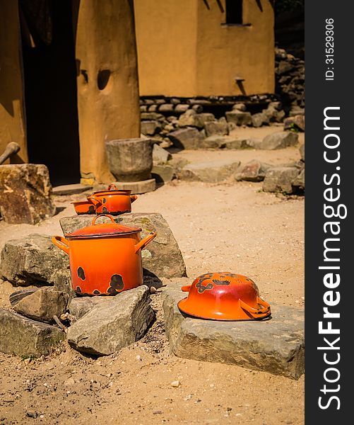 Orange pots and pans