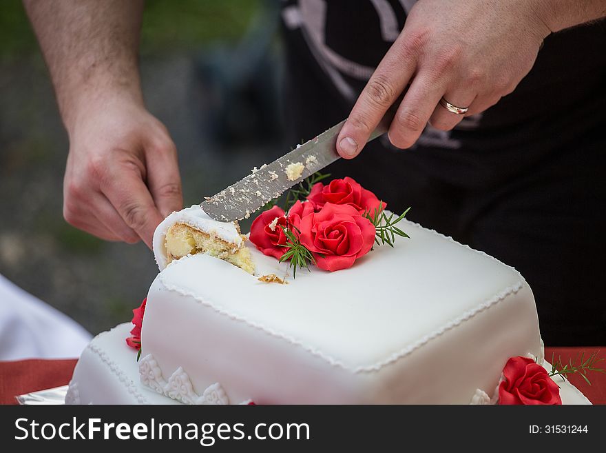 Cutting the wedding cake in out