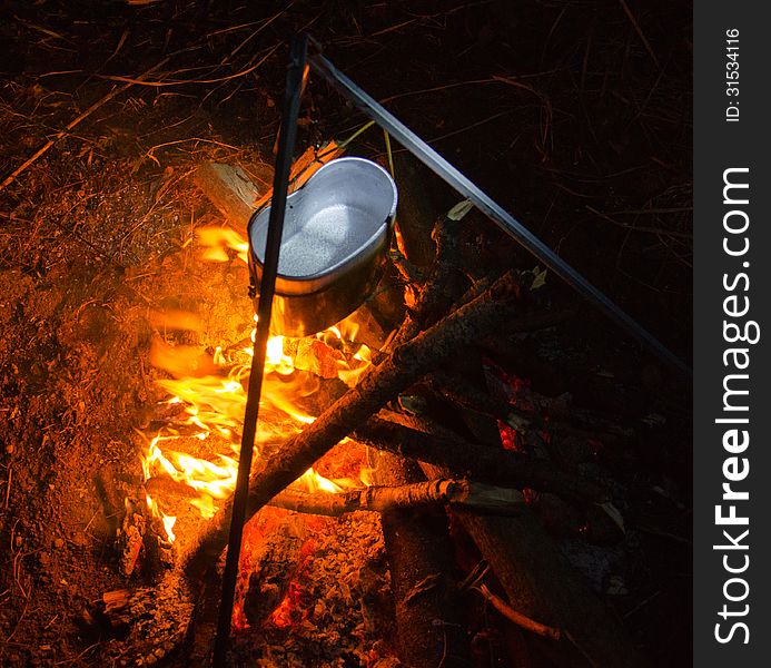 Boiling Water On Bonfire