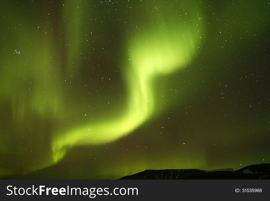 Magnetic particles are blown on the solar winds, creating the Northern Lights