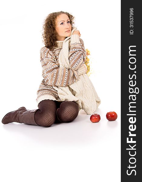 Girl sitting comfortably and is heated with apples