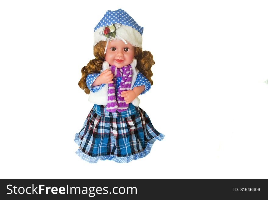 The doll in a beautiful dress, cap , with long hair. The doll in a beautiful dress, cap , with long hair