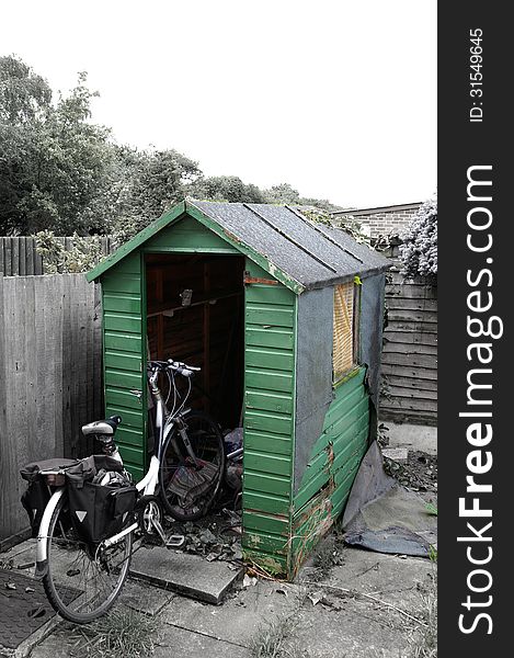 An old shed rotting away in the garden. An old shed rotting away in the garden