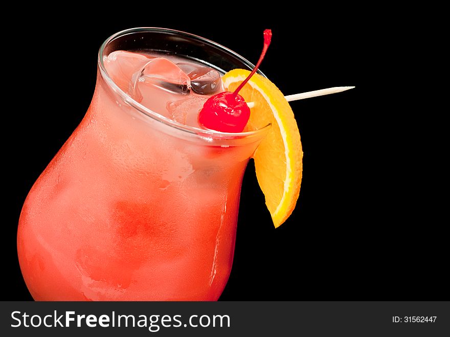 Cocktail With Red Cherry And Orange Closeup