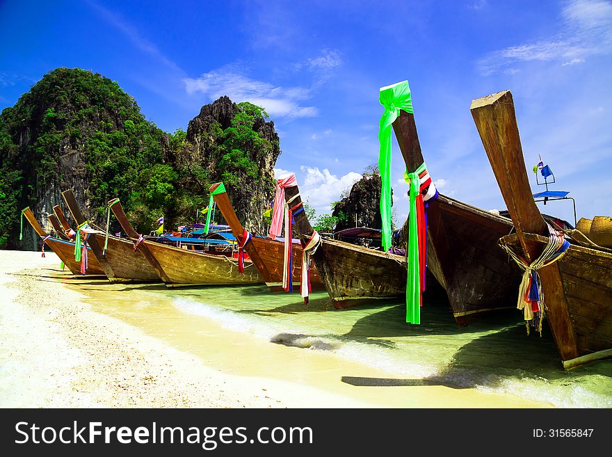 Long tail boat on beautiful tropical beach, Krabi, Thailand - Holiday vacation concept background