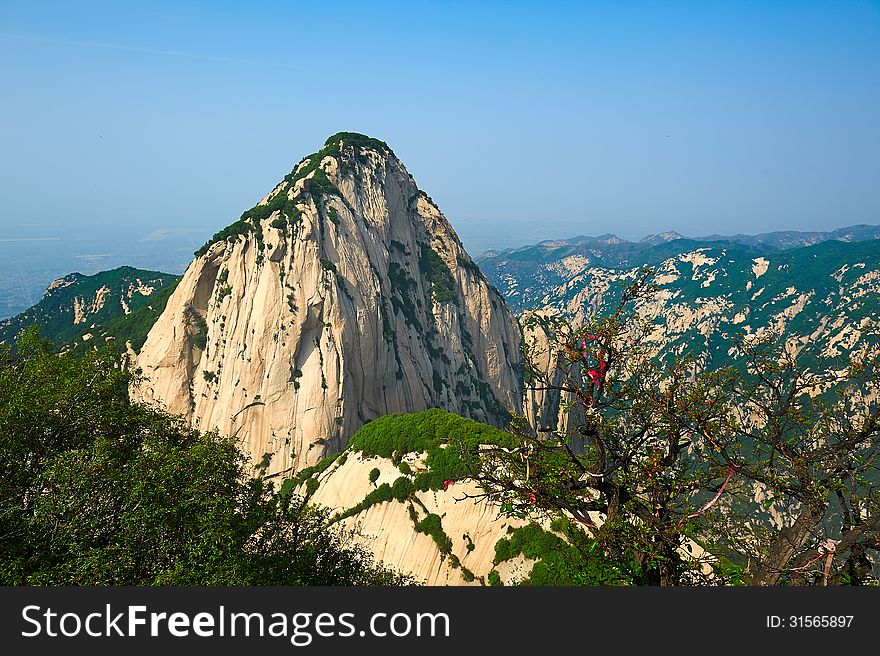 The image taken in chinas shanxi province xian city huashan scenic spot. Time is in 2013 at the beginning of May.Huashan consists of five peaks, is Chinas most unique mountain scenic area. The image taken in chinas shanxi province xian city huashan scenic spot. Time is in 2013 at the beginning of May.Huashan consists of five peaks, is Chinas most unique mountain scenic area.