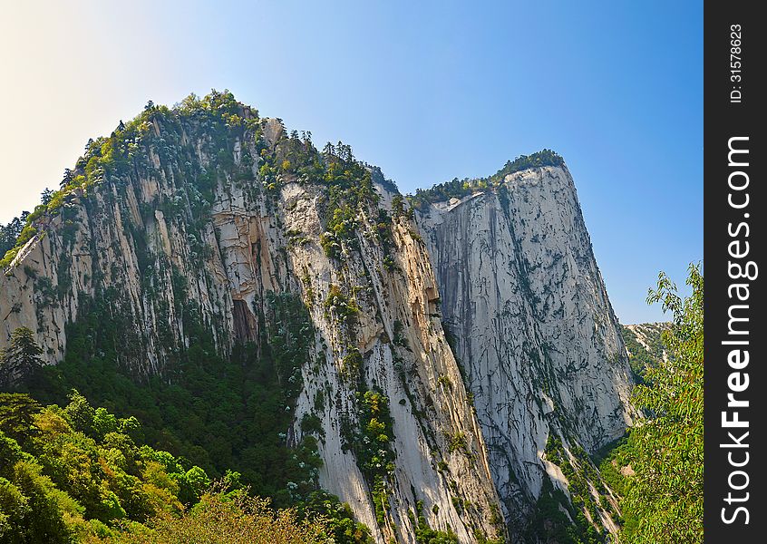 The image taken in chinas shanxi province xian city Hua mountain scenic spot.Time is in 2013 at the beginning of May.Hua mountain consists of five peaks, is Chinas most unique mountain scenic area. The image taken in chinas shanxi province xian city Hua mountain scenic spot.Time is in 2013 at the beginning of May.Hua mountain consists of five peaks, is Chinas most unique mountain scenic area.