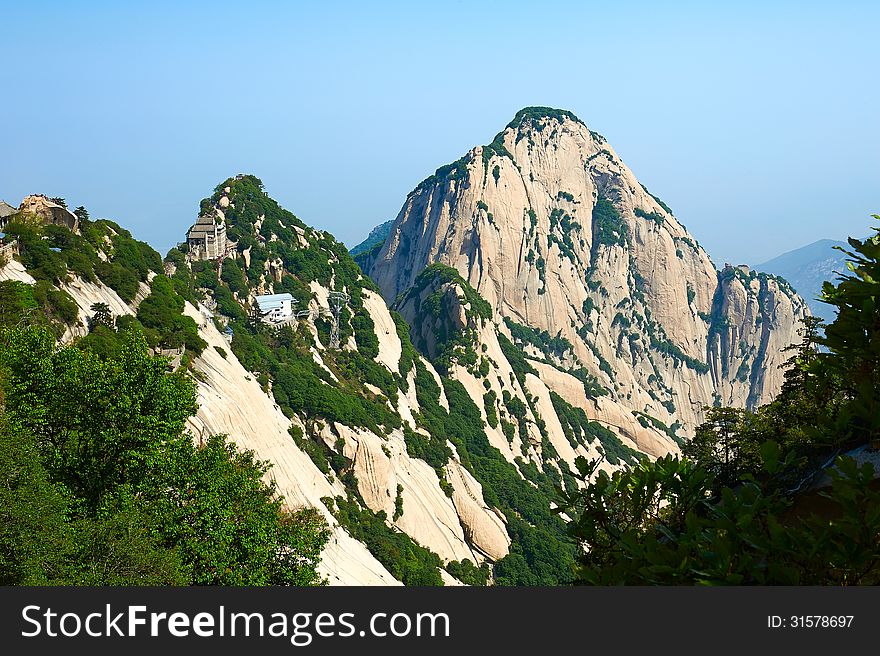 The image taken in chinas shanxi province xian city Hua mountain scenic spot.Time is in 2013 at the beginning of May.Hua mountain consists of five peaks, is Chinas most unique mountain scenic area. The image taken in chinas shanxi province xian city Hua mountain scenic spot.Time is in 2013 at the beginning of May.Hua mountain consists of five peaks, is Chinas most unique mountain scenic area.