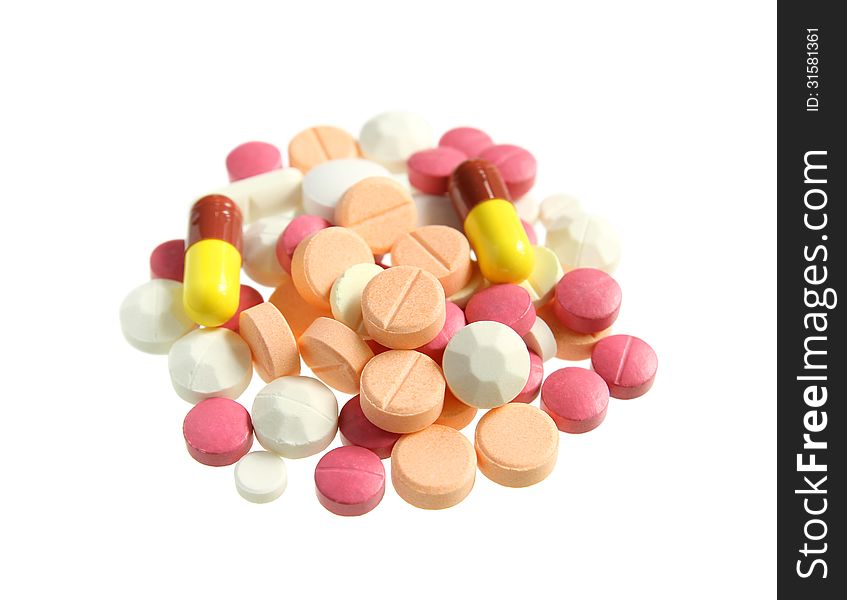 Pile of various pills isolated on white background