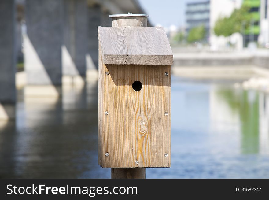 A rustic-looking bird house. A rustic-looking bird house