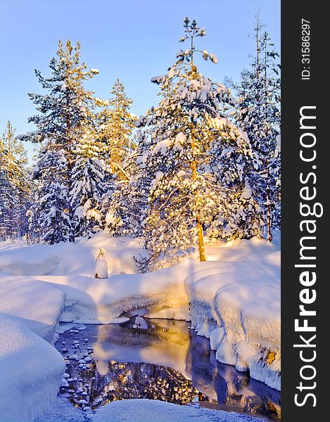 Winter in Finland, Karelia, morning sun. Winter in Finland, Karelia, morning sun.