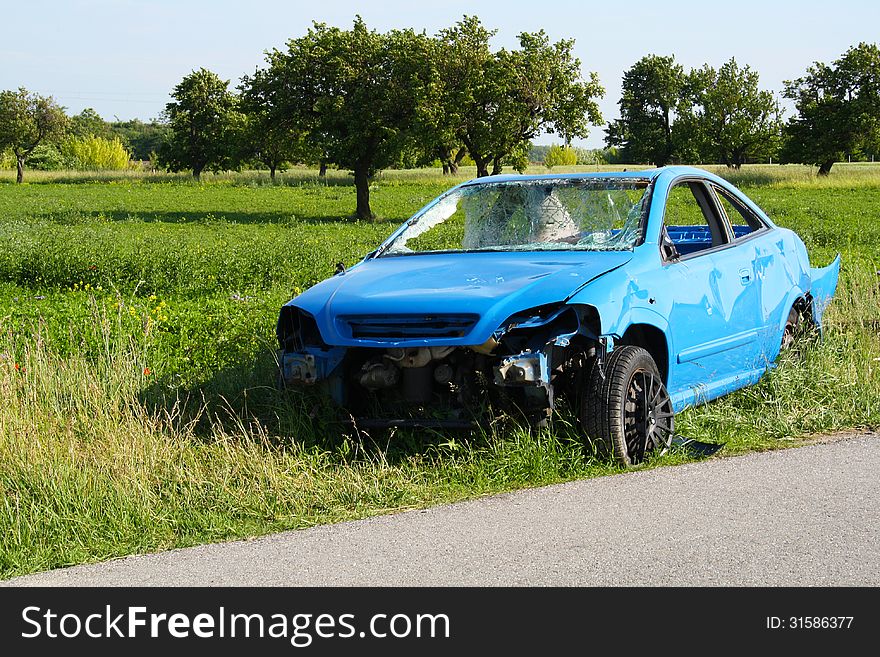 A car wreck in a countryside.