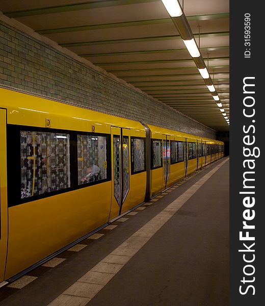 Deserted subway station with train