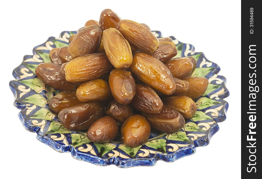 Dried figs in the Central Asian ceramic saucer