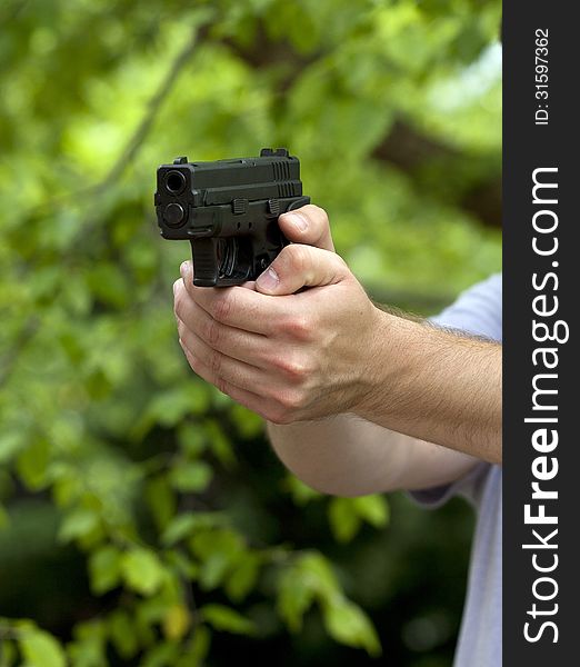 This is an image of aiming a handgun. This is an image of aiming a handgun.