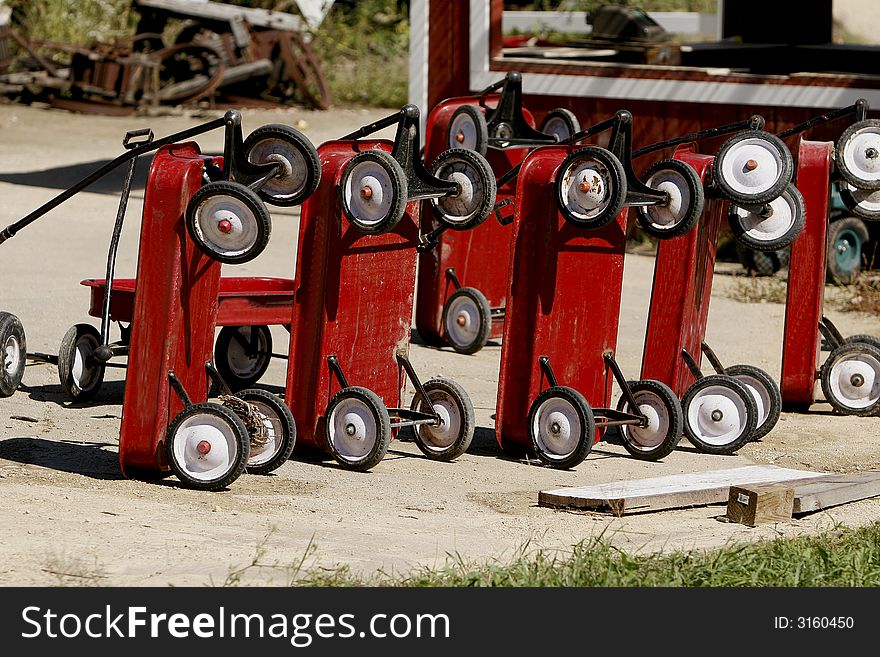 A bunch of wagons lined up ready to go. A bunch of wagons lined up ready to go